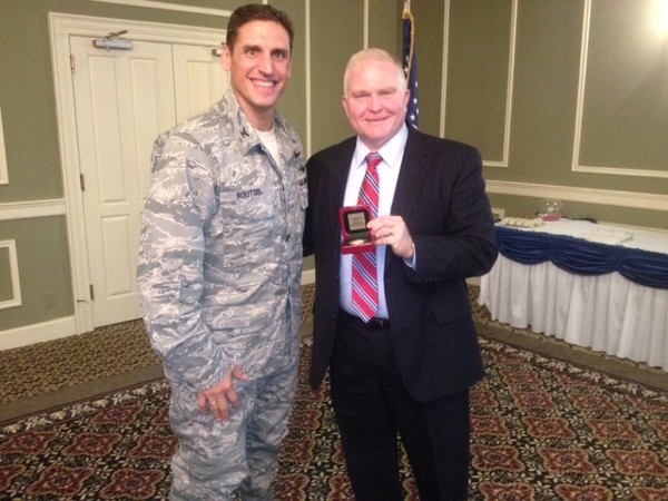 Col. Donovan L. Routsis, USAF (l), chapter president and commander, 55 Communications Group, Omaha, Nebraska, meets with Jerry L. Gandy, director, Mission Assessment and Analysis Directorate, U.S. Strategic Command, Offutt Air Force Base. Gandy received a chapter coin for speaking to the chapter in September.